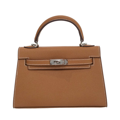 Brown handbag with a silver clasp on a white background