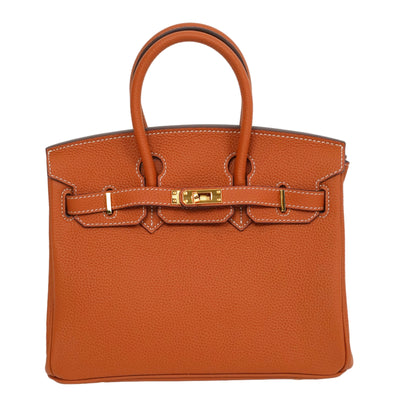Brown handbag with gold hardware on a white background